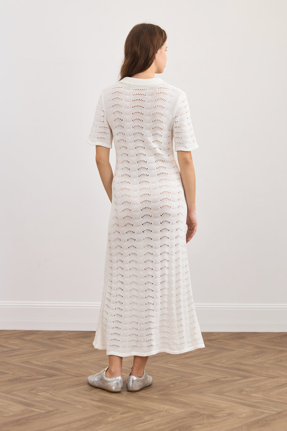 Хвиляста в'язана сукня