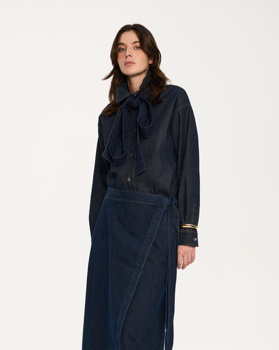 Model wearing indigo Italian denim bow overshirt with long sleeves and straight silhouette, front portrait view – Inner Tiger