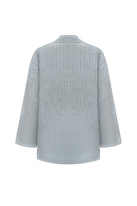 Back view of a striped shirt on a white background